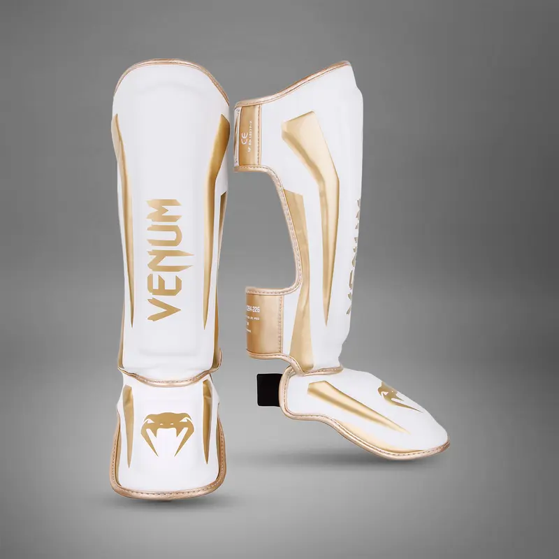 Protège-tibias Venum Elite - Blanc/Doré
