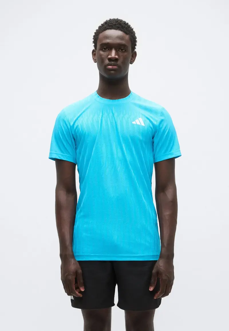 T-SHIRT ADIDAS FREELIFT PRO MELBOURNE BLEU